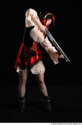 DARINA STANDING POSE WITH SHOTGUN